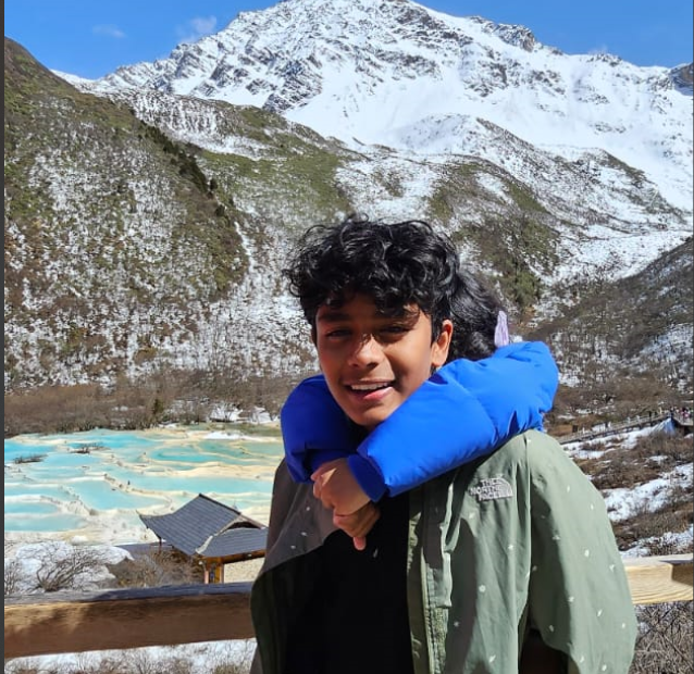 Rishi hiking with his sister